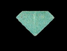 Rückseite einer blaue Punischer XTC Tablette mit Bruchrille