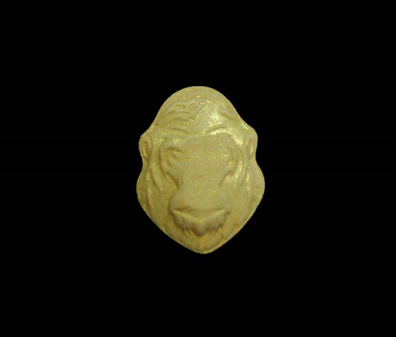 Dieses Bild zeigt eine goldene Pille in Gorilla-Form.